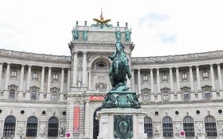 Statue in Front of Neue Burg Wing in Hofburg Palace, Vienna, Austria photo