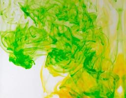 Food color drop and dissolve in water for abstract and background. photo