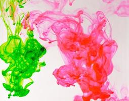 Food color drop and dissolve in water for abstract and background. photo