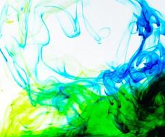 Food color drop and dissolve in water for abstract and background. photo