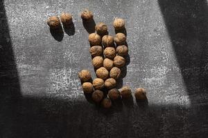 Walnuts on rustic background photo