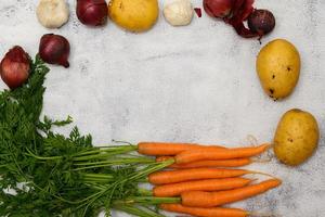 Vegetables on a rustic table photo