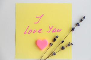 note with the inscription I love you with heart and lavender photo