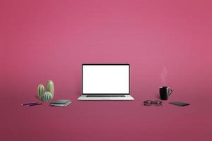 maqueta de portátil rodeada de cosas para trabajar sobre fondo rosa. pantalla aislada para presentación de página web foto