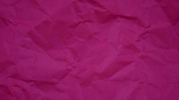 Crumpled wrinkled sheet of paper background texture. Stop motion animation. Seamless looping. video