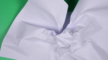 Stop motion animation paper wrinkles green screen. video