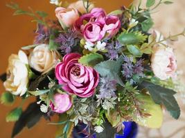 colorful rose flower bouquet in vase photo