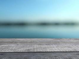 An old plank with a blurry indigo background. Used as a counter for placing products for presentations and advertisements. photo