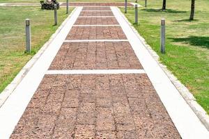 Brown stone walkway in garden photo