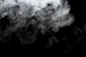 Abstract powder or smoke isolated on black background photo