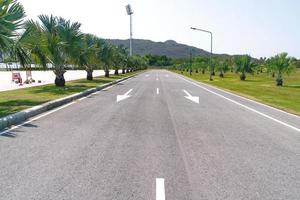 asphalt road with white arrow photo