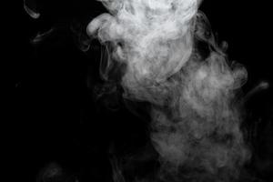 Abstract powder or smoke isolated on black background photo