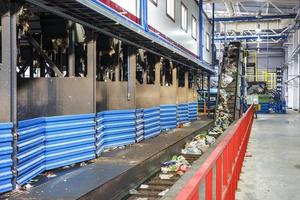 Modern waste recycling processing plant. Separate garbage collection. Recycling and storage of waste for further disposal. photo