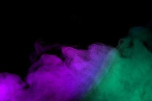 Abstract smoke isolated on black background,Rainbow powder photo