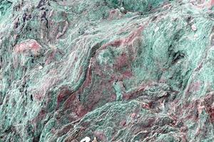 closeup colorful igneous rock background photo