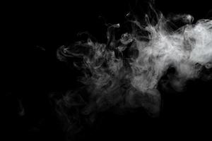 Abstract powder or smoke effect isolated on black background photo