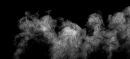 Abstract powder or smoke effect isolated on black background photo