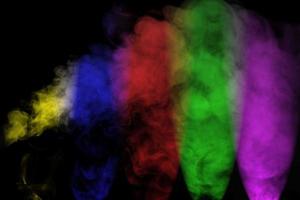 Abstract smoke isolated on black background,Rainbow powder photo