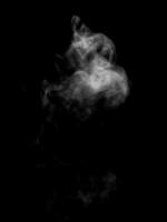 Abstract powder or smoke effect isolated on black background photo