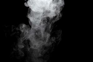 Abstract powder or smoke effect isolated on black background photo