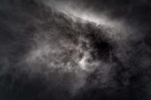 white cloud and black sky textured background photo