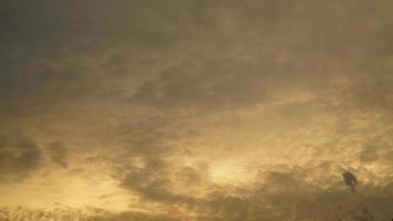 black cloud and golden sky background photo