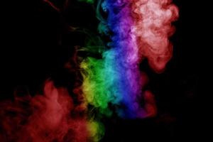 Abstract smoke isolated on black background,Rainbow powder photo