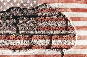 USA flag overlay on old granite brick and cement wall texture for background use photo