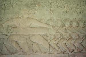 Ancient Khmer bas relief wall carving inside the inner wall of Angkor Wat, Cambodia. photo