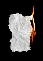 burning paper dark background photo