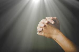 woman hands praying to god photo