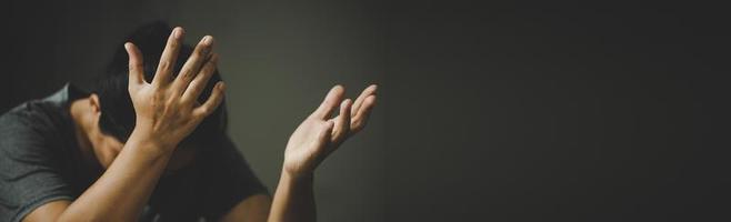 Banner image of Hands folded in prayer in church concept photo