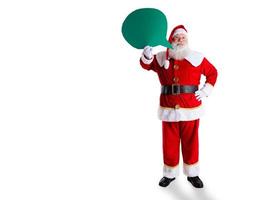 Santa Claus holding blank text balloon. photo