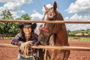 Beautiful woman and horse photo