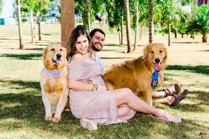 Couple pregnancy photos with dogs