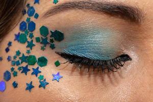 Carnival Makeup to celebrate Brazil's Carnaval. Makeup trend and accessories for the carnival. photo