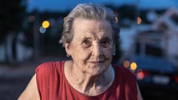 Beautiful older woman laughing and smiling. Smiling elderly woman. photo