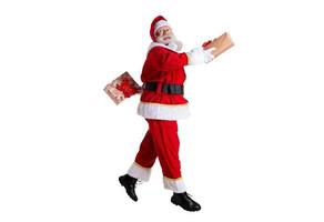 Santa Claus running on white background photo