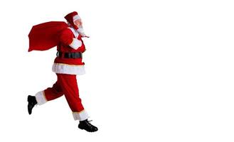 Santa Claus running on white background photo