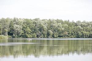 Lake with forest and summer camping tends holidays background fine art high quality prints products fifty megapixels Absberg photo