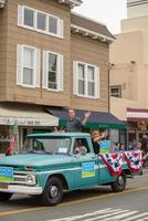 July 4th, 2022 Larkspur California USA, Corte Madera Larkspur 4th of July Parade, Damon Connolly Democratic Candidate for State Assembly shown in front of the Lark Theatre photo