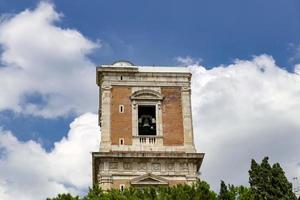 Belltower of Santa Chiara Church in Naples, Italy photo