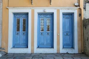 Doors of a House in Symi Island, Greece photo