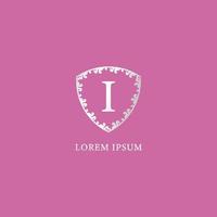 I Letter Intial logo design template. Luxury silver decorative floral shield illustration. Suitable for Insurance, fashion and beauty product. Isolated on pink color background. vector