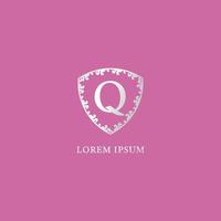 Q Letter Intial logo design template Isolated on pink color background. Luxury silver decorative floral shield illustration. Suitable for Insurance, fashion and beauty product. vector