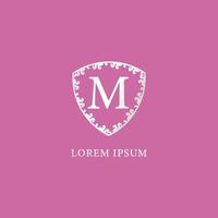 M Letter Intial logo design template. Luxury silver decorative floral shield illustration. Suitable for Insurance, fashion and beauty product. Isolated on pink color background. vector