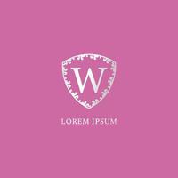 W Letter Intial logo design template. Luxury silver decorative floral shield illustration. Suitable for Insurance, fashion and beauty product. Isolated on pink color background. vector