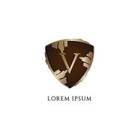 Luxury Decorative metallic gold shield sign illustration. Letter V alphabet logo design template. Initial abjad logo concept. Insurance, Protection, Guard, Security. vector