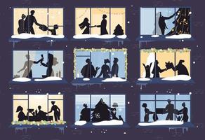 Christmas window with happy family silhouette