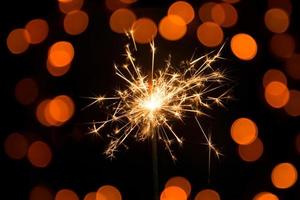 Sparklers and background with bokeh photo